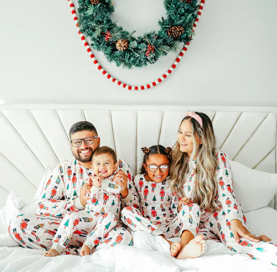 family in matching christmas jammies pyjamas